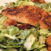 Fresh Blackened Salmon Over Caesar Salad
